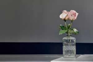 Two roses in crystal glass vase Two roses in crystal glass vase